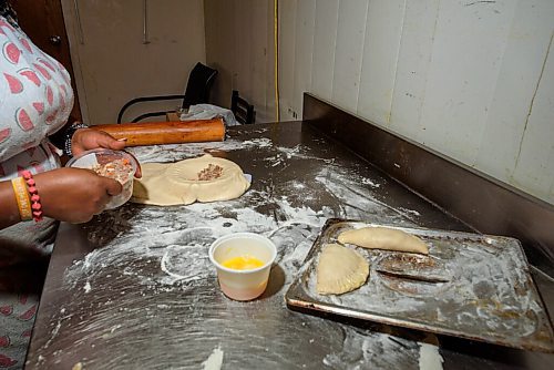 JESSE BOILY  / WINNIPEG FREE PRESS
A worker cooks meat pies at One Stop African Restaurant on Thursday. One Stop is part of Folkloramas scavenger hunt of of local destinations and restaurants. Thursday, July 30, 2020.
Reporter: Eva Wasney