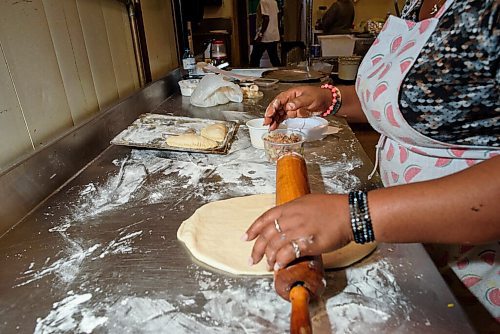 JESSE BOILY  / WINNIPEG FREE PRESS
A worker cooks meat pies at One Stop African Restaurant on Thursday. One Stop is part of Folkloramas scavenger hunt of of local destinations and restaurants. Thursday, July 30, 2020.
Reporter: Eva Wasney