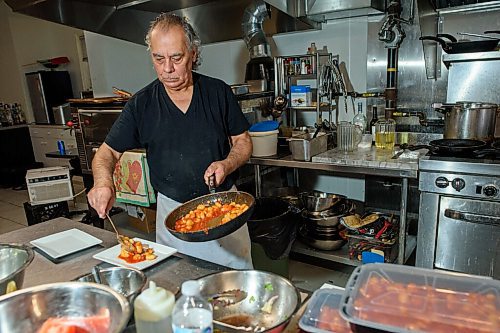 JESSE BOILY  / WINNIPEG FREE PRESS
Michael Pepé cooks up some pasta at Nuccis Gelati on Friday. Nuccis is part of Folkloramas scavenger hunt of of local destinations and restaurants. Friday, July 31, 2020.
Reporter: Eva Wasney