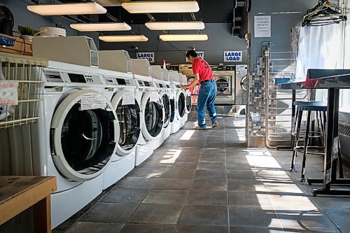 Daniel Crump / Winnipeg Free Press. Spin City laundromat on Edmonton Street is getting ahead of contact tracing with a sign-in sheet. New and existing customers must sign in if they wish make use of the businesses services. August 1, 2020.