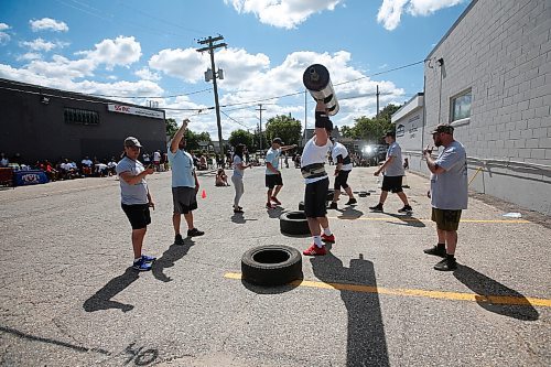 JOHN WOODS / WINNIPEG FREE PRESS
Tyler Sigurdson, left, and James Jeffers compete in the Log Clean and Press at  the third annual Manitoba Classic Strongman Competition at Brickhouse Gym in Winnipeg Sunday, August 2, 2020. Competitors competed in the Yoke - Farmers Medley, Log Clean and Press, Loading Race, Axle Deadlift and the Tire Flip. Proceeds were donated to Little Warriors childrens charity.

Reporter: Standup