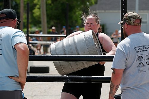 JOHN WOODS / WINNIPEG FREE PRESS
Mara Rozitis tosses a keg as she competes in the Loading Race at the third annual Manitoba Classic Strongman Competition at Brickhouse Gym in Winnipeg Sunday, August 2, 2020. Competitors competed in the Yoke - Farmers Medley, Log Clean and Press, Loading Race, Axle Deadlift and the Tire Flip. Proceeds were donated to Little Warriors childrens charity.

Reporter: Standup