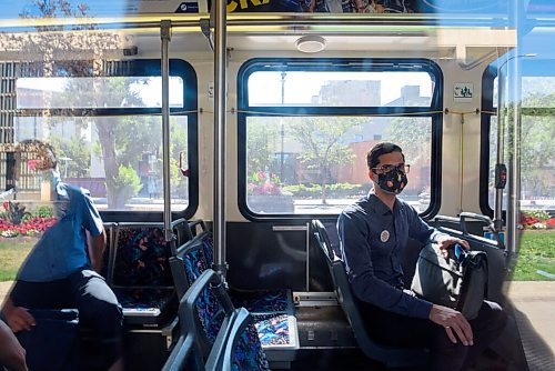 JESSE BOILY  / WINNIPEG FREE PRESS
Derek Koop,President of Functional Transit Winnipeg,sits in a bus outside City Hall on Tuesday. Transit is now asking commuters to wear a mask while on transit. Tuesday, Aug. 4, 2020.
Reporter: Joyanne