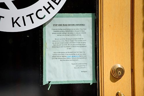 JESSE BOILY  / WINNIPEG FREE PRESS
A notice on the door at Bodegoes asks costumers not to enter if they are feeling unwell on Tuesday. Nick Van Seggelen, owner of Bodegoes, thinks restaurant owners need to take more responsibility ensuring costumers are physically distanced. Tuesday, Aug. 4, 2020.
Reporter: Piche