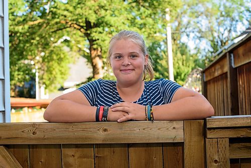 JESSE BOILY  / WINNIPEG FREE PRESS
Sarah-Joy McQuade, 16, received the Sunshine fund this year which will help her get to camp, stops for a photo outside her home on Wednesday. Wednesday, Aug. 5, 2020.
Reporter: Kellen