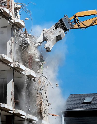 RUTH BONNEVILLE / WINNIPEG FREE PRESS

LOCAL - Misericordia (MERC) demo

Photo of the demolition clawing of the  Misericordia Education and Resource Centre buildings exterior walls on Thursday.  Clean-up  will take up to a month, with the majority of the materials being recycled.

Caroline DeKeyster, Misericordias President & CEO holds media conference next to the demolition site on Thursday. 

 Aug 6th, 2020