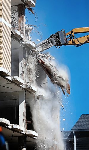 RUTH BONNEVILLE / WINNIPEG FREE PRESS

LOCAL - Misericordia (MERC) demo

Photo of the demolition clawing of the  Misericordia Education and Resource Centre buildings exterior walls on Thursday.  Clean-up  will take up to a month, with the majority of the materials being recycled.

Caroline DeKeyster, Misericordias President & CEO holds media conference next to the demolition site on Thursday. 

 Aug 6th, 2020