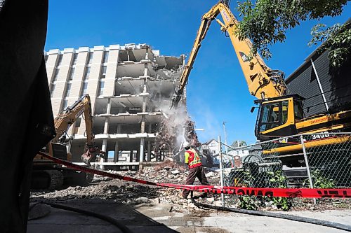 RUTH BONNEVILLE / WINNIPEG FREE PRESS

LOCAL - Misericordia (MERC) demo

Photo of the demolition clawing of the  Misericordia Education and Resource Centre buildings exterior walls on Thursday.  Clean-up  will take up to a month, with the majority of the materials being recycled.

Caroline DeKeyster, Misericordias President & CEO holds media conference next to the demolition site on Thursday. 

 Aug 6th, 2020