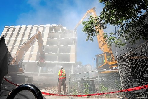 RUTH BONNEVILLE / WINNIPEG FREE PRESS

LOCAL - Misericordia (MERC) demo

Photo of the demolition clawing of the  Misericordia Education and Resource Centre buildings exterior walls on Thursday.  Clean-up  will take up to a month, with the majority of the materials being recycled.

Caroline DeKeyster, Misericordias President & CEO holds media conference next to the demolition site on Thursday. 

 Aug 6th, 2020