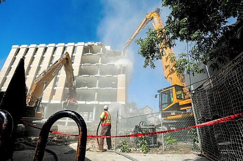 RUTH BONNEVILLE / WINNIPEG FREE PRESS

LOCAL - Misericordia (MERC) demo

Photo of the demolition clawing of the  Misericordia Education and Resource Centre buildings exterior walls on Thursday.  Clean-up  will take up to a month, with the majority of the materials being recycled.

Caroline DeKeyster, Misericordias President & CEO holds media conference next to the demolition site on Thursday. 

 Aug 6th, 2020