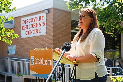 MIKE DEAL / WINNIPEG FREE PRESS
Wab Kinew, Leader of the Manitoba NDP and Laura Burla, Executive Director for St. James Montessori School speak at a press conference outside the Discovery Children's Centre at 367 Hampton Street, Thursday afternoon.
The NDP is calling out the province on its proposed funding cuts which are based on a KPMG review of the child care sector in Manitoba.
200806 - Thursday, August 06, 2020.