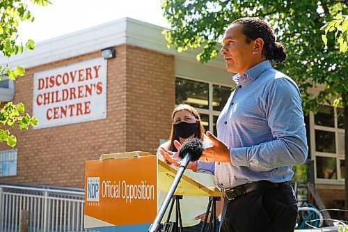 MIKE DEAL / WINNIPEG FREE PRESS
Wab Kinew, Leader of the Manitoba NDP and Laura Burla, Executive Director for St. James Montessori School speak at a press conference outside the Discovery Children's Centre at 367 Hampton Street, Thursday afternoon.
The NDP is calling out the province on its proposed funding cuts which are based on a KPMG review of the child care sector in Manitoba.
200806 - Thursday, August 06, 2020.