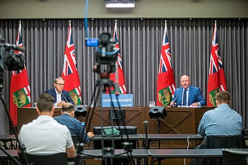 MIKAELA MACKENZIE / WINNIPEG FREE PRESS

Chief provincial public health officer Dr. Brent Roussin (right) and health, seniors and active living minister Cameron Friesen update the media about the COVID-19 situation in Winnipeg on Thursday, Aug. 6, 2020. For Carol Sanders story.
Winnipeg Free Press 2020.