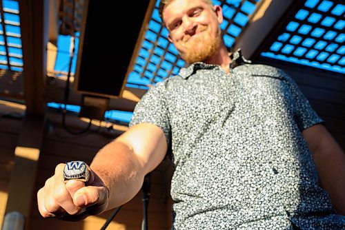 JESSE BOILY / WINNIPEG FREE PRESS
Adam Bighill shows off their new Grey Cup ring at Confusion Corner Drinks & Food on Thursday. Thursday, Aug. 6, 2020.
Reporter: