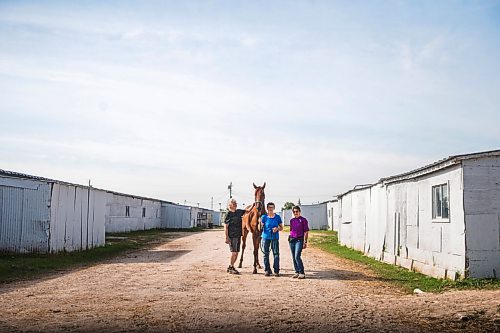 MIKAELA MACKENZIE / WINNIPEG FREE PRESS

Sisters Donna, Marion, and Linda Johnston pose for a portrait with Barbie's Quest at the Assiniboia Downs backstretch in Winnipeg on Friday, Aug. 7, 2020. The three trainers are having a career year. For George Williams story.
Winnipeg Free Press 2020.