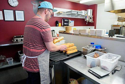 JESSE BOILY  / WINNIPEG FREE PRESS
Nick Graumann, owner of Nicks on Broadway, stacks up some freshly made bread for his sandwiches at his restaurant on Friday. Friday, Aug. 7, 2020.
Reporter: Sanderson