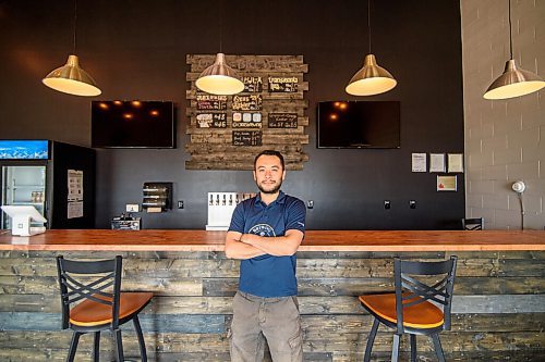 Mike Sudoma / Winnipeg Free Press
Oxus Brewing Company owner, Sean Shoyoqubov, standing in his brewerys taproom Friday afternoon
August 7, 2020