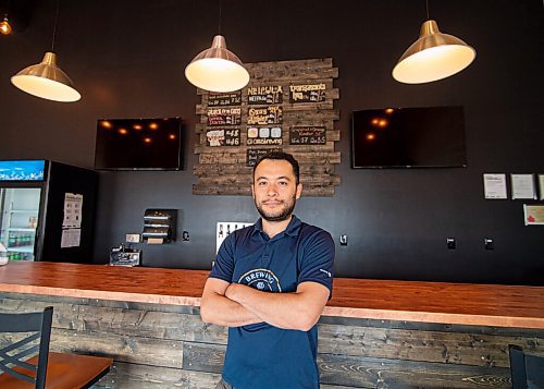 Mike Sudoma / Winnipeg Free Press
Oxus Brewing Company owner, Sean Shoyoqubov, standing in his brewerys taproom Friday afternoon
August 7, 2020