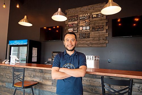 Mike Sudoma / Winnipeg Free Press
Oxus Brewing Company owner, Sean Shoyoqubov, standing in his brewerys taproom Friday afternoon
August 7, 2020