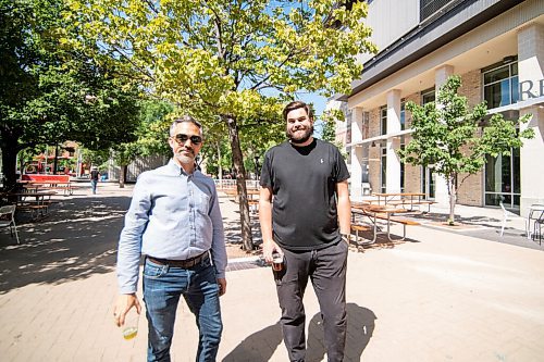 Mike Sudoma / Winnipeg Free Press
David Pensato of the Exchange Biz and Max Frank, bar manager of the newly opened Bijou Patio, located in Bijou Park beside the cube in the Exchange District 
August 7, 2020
