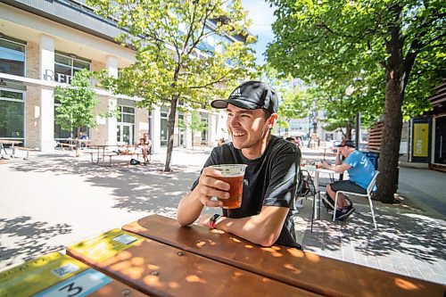 Mike Sudoma / Winnipeg Free Press
Graham McCallum sips a beer on the newly opened Bijou Patio, located at Bijou park in the Exchange District Saturday afternoon
August 7, 2020