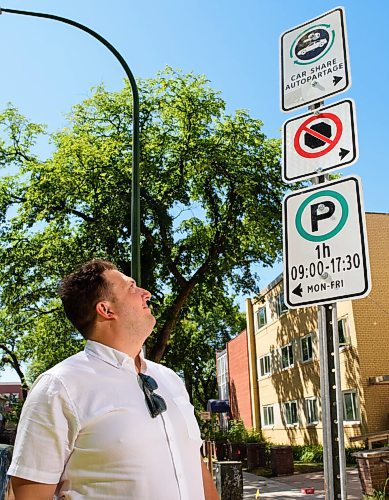 JESSE BOILY  / WINNIPEG FREE PRESS
 Philip Mikulec, Operations Manager of Peg City Car Co-op, shows one of the new street parking spots for car sharing services on Roslyn Rd. on Monday. Monday, Aug. 10, 2020.
Reporter: Temur Durrani