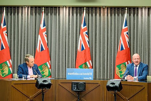 JESSE BOILY  / WINNIPEG FREE PRESS
Dr. Brent Roussin, right, chief provincial public health officer Health, and  Seniors and Active Living Minister Cameron Friesen give an update on the COVID-19 response in the province at the Legislature building on Monday. Monday, Aug. 10, 2020.
Reporter: Larry