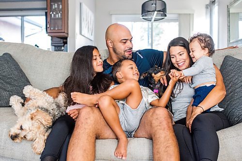 MIKAELA MACKENZIE / WINNIPEG FREE PRESS

Jason Vega, ex-Blue Bomber, poses for a portrait with his family (children Evan, 11 months, Adrian, three, Jazi, eight, and his wife, Brittany) at home in Winnipeg on Tuesday, Aug. 11, 2020. For Dave Sanderson story.
Winnipeg Free Press 2020.