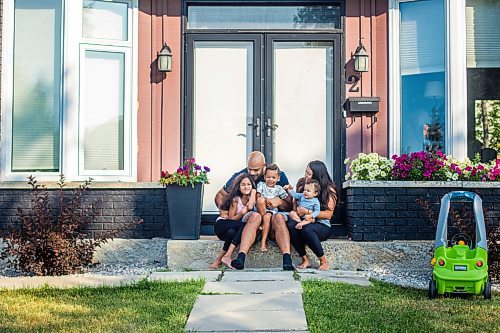 MIKAELA MACKENZIE / WINNIPEG FREE PRESS

Jason Vega, ex-Blue Bomber, poses for a portrait with his family (children Evan, 11 months, Adrian, three, Jazi, eight, and his wife, Brittany) at home in Winnipeg on Tuesday, Aug. 11, 2020. For Dave Sanderson story.
Winnipeg Free Press 2020.