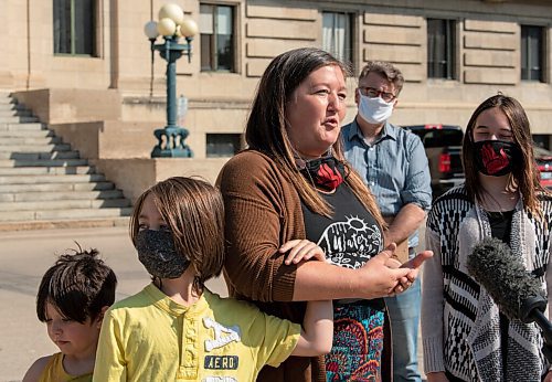 JESSE BOILY  / WINNIPEG FREE PRESS
Kisa MacIsaac, an early childhood educator speaks to media outside of the Legislative building on Tuesday. The Manitoba Liberals want to see more funding to early childhood care. Tuesday, Aug. 11, 2020.
Reporter: