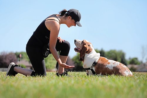 RUTH BONNEVILLE / WINNIPEG FREE PRESS

local - dog training

Photo of  Leesa Westwood co-owner of  Pliant Pack Positive Dog Training with one of her dogs, Otis, teaching him at Riccardo De Thomasis Park Monday. 

Subject: Leesa Westwood (hat) and Emily Lowes  are the co-owners of Pliant Pack Positive Dog Training. 

Photos of them with their different dogs doing tricks and training techniques at Riccardo De Thomasis Park Monday. 

See Eva Wasney's story

 Aug 10th, 2020