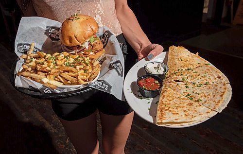 JESSE BOILY / WINNIPEG FREE PRESS
Shayla Kolomaya serves up some the dishes at Leopold's on Academy on Tuesday, Aug. 11, 2020.
Reporter: ??