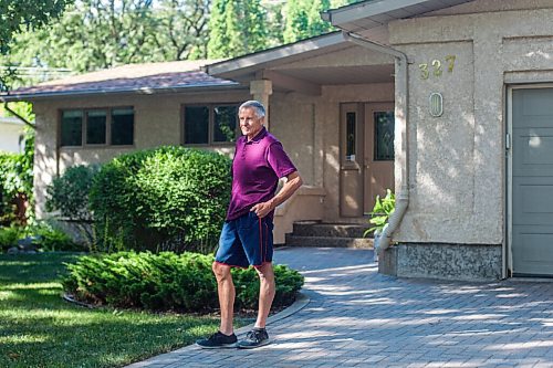 MIKAELA MACKENZIE / WINNIPEG FREE PRESS

Ed Lohrenz, geothermal heat pump expert, poses for a portrait outside of his home (which has the system) in Winnipeg on Wednesday, Aug. 12, 2020. The tubes are buried beneath the front yard. For Sarah story.
Winnipeg Free Press 2020.