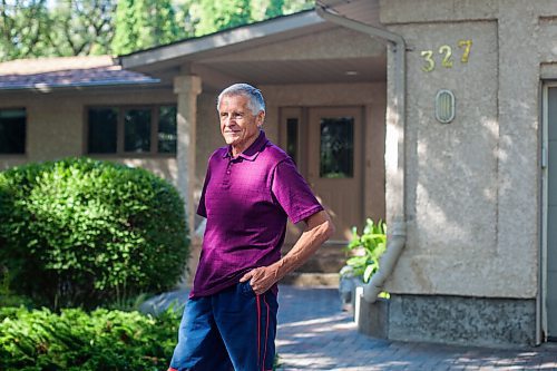 MIKAELA MACKENZIE / WINNIPEG FREE PRESS

Ed Lohrenz, geothermal heat pump expert, poses for a portrait outside of his home (which has the system) in Winnipeg on Wednesday, Aug. 12, 2020. The tubes are buried beneath the front yard. For Sarah story.
Winnipeg Free Press 2020.