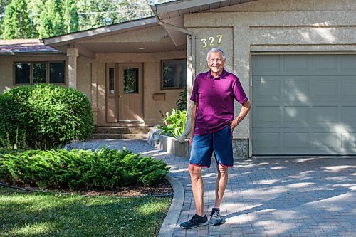 MIKAELA MACKENZIE / WINNIPEG FREE PRESS

Ed Lohrenz, geothermal heat pump expert, poses for a portrait outside of his home (which has the system) in Winnipeg on Wednesday, Aug. 12, 2020. The tubes are buried beneath the front yard. For Sarah story.
Winnipeg Free Press 2020.