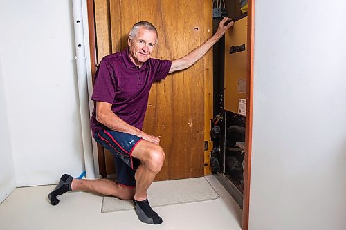 MIKAELA MACKENZIE / WINNIPEG FREE PRESS

Ed Lohrenz, geothermal heat pump expert, poses for a portrait in his home (beside the furnace system) in Winnipeg on Wednesday, Aug. 12, 2020. For Sarah story.
Winnipeg Free Press 2020.