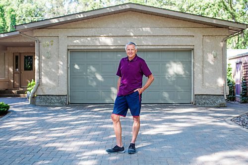 MIKAELA MACKENZIE / WINNIPEG FREE PRESS

Ed Lohrenz, geothermal heat pump expert, poses for a portrait outside of his home (which has the system) in Winnipeg on Wednesday, Aug. 12, 2020. The tubes are buried beneath the front yard. For Sarah story.
Winnipeg Free Press 2020.