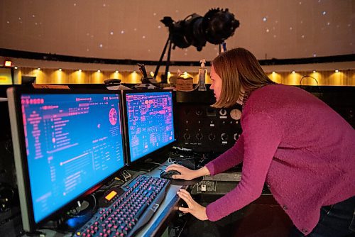 JESSE BOILY / WINNIPEG FREE PRESS
Nicole Desautels, a science communicator, shows displays some of the solar system at the planetarium on Wednesday, Aug. 12, 2020. The planetarium will be opening to the public on Thursday. 
Reporter: Standup