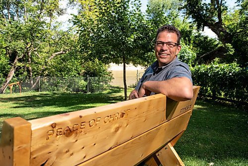 JESSE BOILY  / WINNIPEG FREE PRESS
Rev. Doug Klassen, Executive Minister of Mennonite Church Canada, stops for a portrait outside his St. James home on Wednesday. Churches are having difficulties with opening and all have different protocols for their returning plan. Wednesday, Aug. 12, 2020.
Reporter:John Longhurst