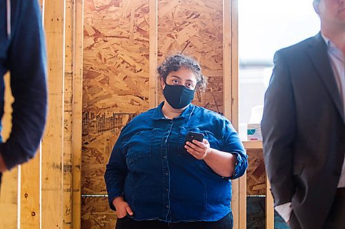 MIKAELA MACKENZIE / WINNIPEG FREE PRESS

Reporter Malak Abas at an announcement for new support for home ownership at a Habitat for Humanity construction site in Winnipeg on Thursday, Aug. 13, 2020. For marketing.
Winnipeg Free Press 2020.