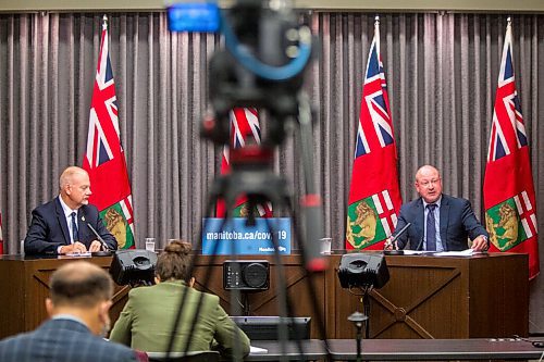 MIKAELA MACKENZIE / WINNIPEG FREE PRESS

Education minister Kelvin Goertzen (left) and Brent Roussin, chief provincial public health officer, speak to the media about COVID-19 and schools re-opening in September at the Manitoba Legislative Building in Winnipeg on Thursday, Aug. 13, 2020. For Maggie Macintosh story.
Winnipeg Free Press 2020.