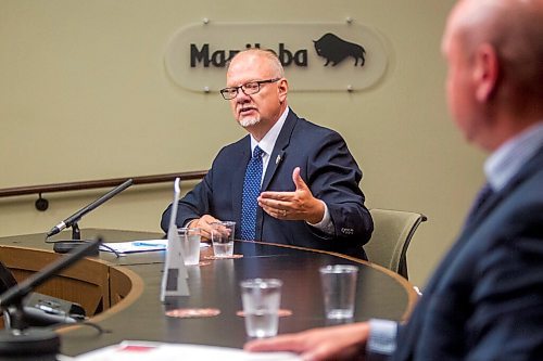 MIKAELA MACKENZIE / WINNIPEG FREE PRESS

Education minister Kelvin Goertzen (left) and Brent Roussin, chief provincial public health officer, speak to the media about COVID-19 and schools re-opening in September at the Manitoba Legislative Building in Winnipeg on Thursday, Aug. 13, 2020. For Maggie Macintosh story.
Winnipeg Free Press 2020.