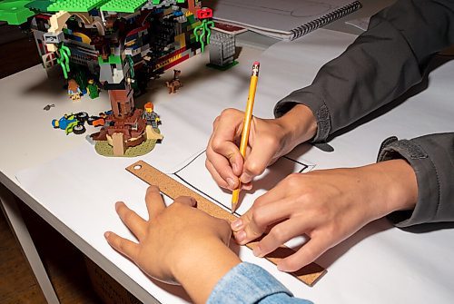 JESSE BOILY  / WINNIPEG FREE PRESS
Lucas John Ursel, 15,  learns how to draw their model home to paper from Romilie Calotes at City Builders Camp at Artspace on Thursday. Thursday, Aug. 13, 2020.
Reporter: