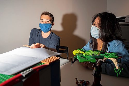 JESSE BOILY  / WINNIPEG FREE PRESS
Lucas John Ursel, 15, left,  learns how to draw their model home to paper from Romilie Calotes at City Builders Camp at Artspace on Thursday. Thursday, Aug. 13, 2020.
Reporter: