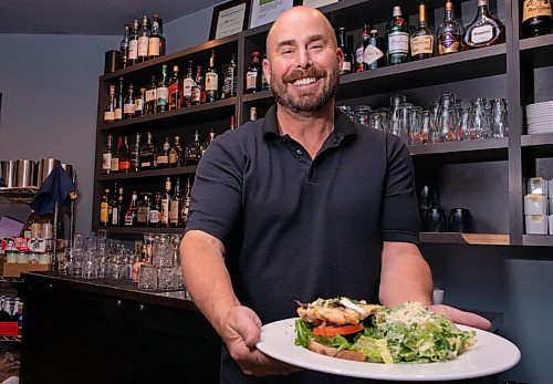 JESSE BOILY  / WINNIPEG FREE PRESS
Greg Gunnarson, co-owner at Capital Grill, stops for a photo in his restaurant in Charleswood on Friday. Friday, Aug. 14, 2020.
Reporter: Allison