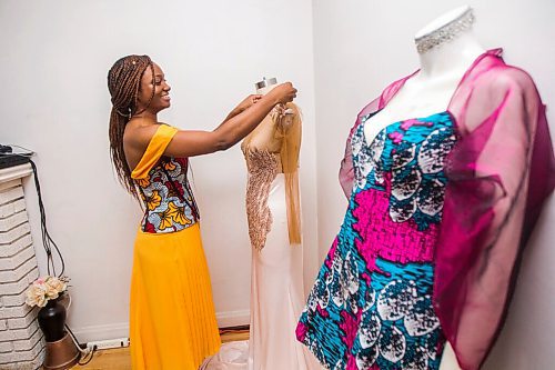 MIKAELA MACKENZIE / WINNIPEG FREE PRESS

Ori Ochoga, who makes beautiful handmade dresses and women's wear under the name Chogah Customs, poses for a portrait in her home studio in Winnipeg on Friday, Aug. 14, 2020. For Eva Wasney story.
Winnipeg Free Press 2020.