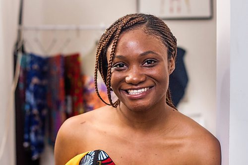 MIKAELA MACKENZIE / WINNIPEG FREE PRESS

Ori Ochoga, who makes beautiful handmade dresses and women's wear under the name Chogah Customs, poses for a portrait in her home studio in Winnipeg on Friday, Aug. 14, 2020. For Eva Wasney story.
Winnipeg Free Press 2020.