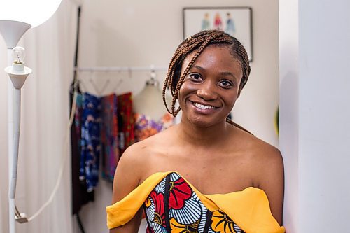 MIKAELA MACKENZIE / WINNIPEG FREE PRESS

Ori Ochoga, who makes beautiful handmade dresses and women's wear under the name Chogah Customs, poses for a portrait in her home studio in Winnipeg on Friday, Aug. 14, 2020. For Eva Wasney story.
Winnipeg Free Press 2020.