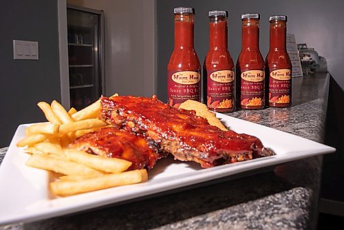 JESSE BOILY  / WINNIPEG FREE PRESS
Ribs with the homemade BBQ sauce at White House Ribs in Charleswood on Friday. Friday, Aug. 14, 2020.
Reporter:Alison
