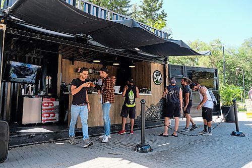 Daniel Crump / Winnipeg Free Press. People order drinks from the bar at Cargo Bar in Assiniboine Park. August 15, 2020.